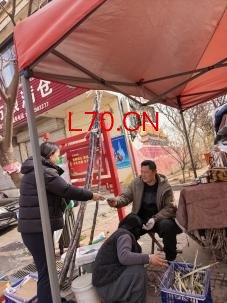 邮储银行临沂市李官支行开展3·15金融消保宣传进集市活动